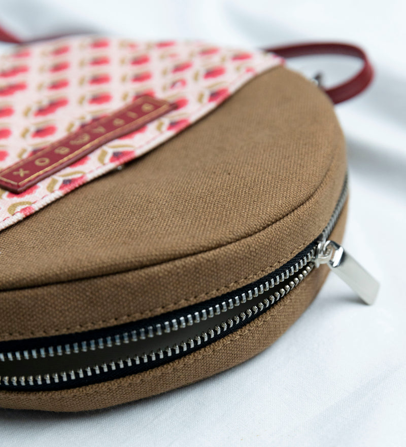 FLORET - Round Sling Bag
