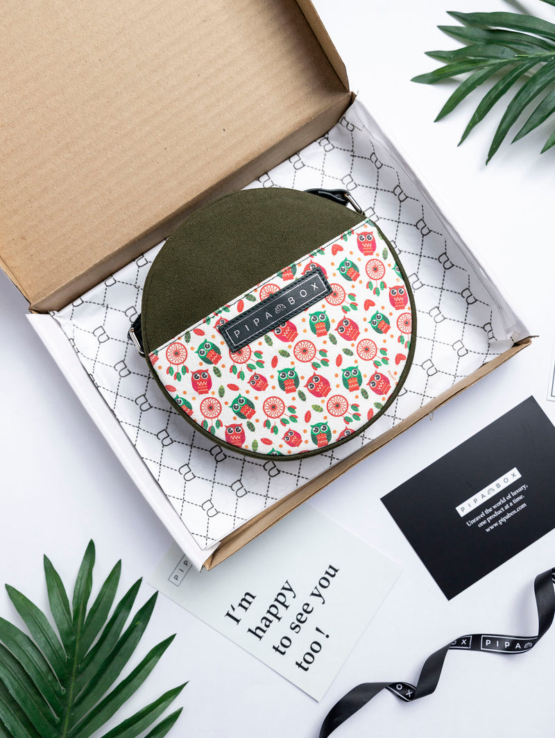 FLORIANA - Round Sling Bag